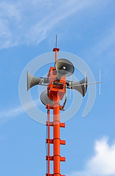 Communications antenna tower on blue sky