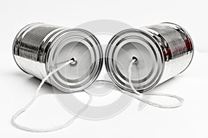 Communications and business calls concept of tin can telephone as way to deliver message and information