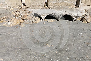 Communications pipes on the beach sand