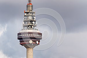 Communications tower of the city of Madrid with a multitude of antenna and signal transmission devices.