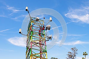 Communications tower colorful Blue Sky