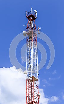Communications tower complete with various antennas and microwa