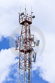 Communications tower complete with various antennas and microwa