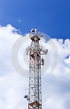 Communications tower complete with various antennas and microwa