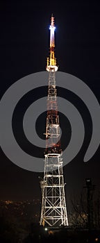 Communications tower at night.