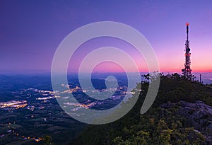 Communications tower over the city providing information and internet to mobiles, Sunset at the Jaizkibel mountain photo