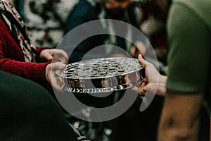 Communion with bread and wine during the service in the assembly