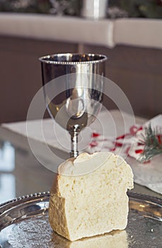 Communion cup and bread