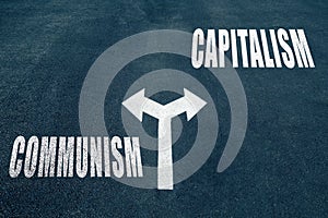 Communism vs capitalism choice concept