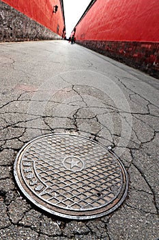 Communist Star on Pavement in Beijing, China photo