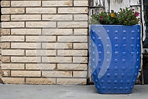 Community City Park bench beside decorative planter