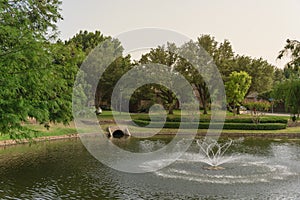 Community lake with outfall sewer in America photo