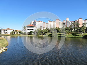 Community lake in a residential area surrounded by homes