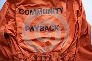 Community payback. Prison clothes, jumpsuit sentenced to correctional labor, criminal penalties