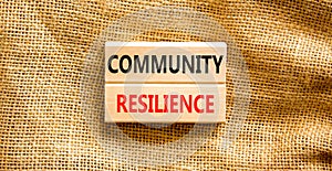 Community resilience symbol. Concept word Community resilience typed on wooden blocks. Beautiful canvas table canvas background.