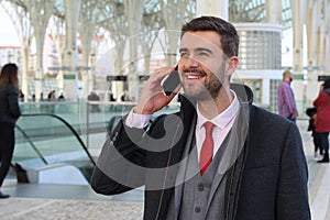 Commuter calling by phone in the crowd