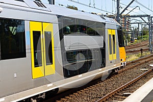 Commuter train approaching Central train station Sydney NSW Australia