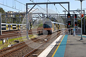 Commuter train approaching Central train station Sydney NSW Australia