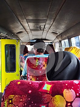 Losari, 24 June 2022 - Commuters inside a public transportation called Elep Car.