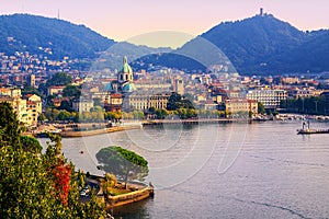 Como city town center on Lake Como, Italy, in warm sunset light