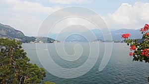 Como Lake on North of Italy. Moving Boats. View from Villa Balbianello.