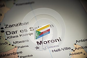 Comoros marked with a flag on the map