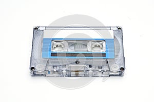 Compact audio tapes for magnetic recording on a white background.Compact cassettte