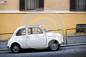 Compact car on Italian street photo