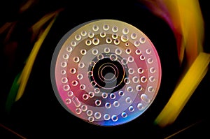 Compact Disk with water drops and vibrant colors