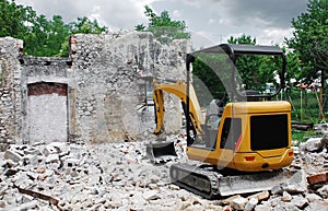 Compact Excavator on Small Building Site