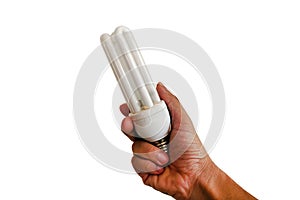 Compact fluorescent lamp or energy saving light bulb in the hand, isolated on a white background.