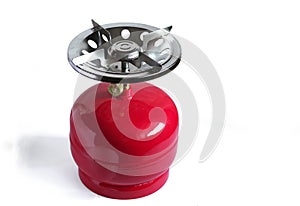 Compact metal gas cylinder and burner for camping stove.