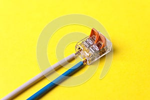 Compact orange splicing connector with two wires phase, zero. Connection concept