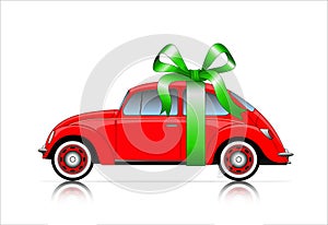 Compact red car with ribbon