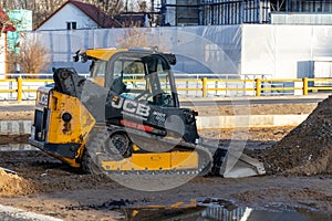 Compact track loader JCB 300T on a construction place. Tracked construction equipment on a construction site. Russia