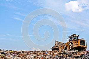 Compactor on a hill at a landfill