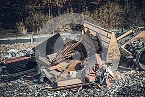 compactor at a landfill processing municipal waste