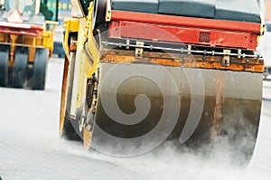 Compactor roller at asphalting work