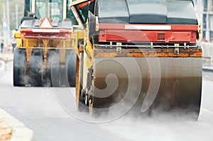 Compactor roller at asphalting work