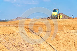 Compactor working on the construction site