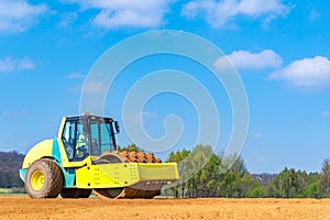 Compactor working on the construction site