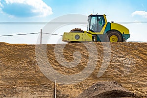 Compactor working on the construction site