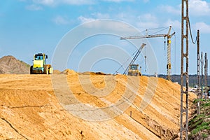 Compactors working on the construction site