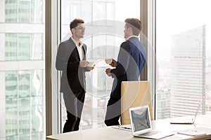 Business partners taking coffee break on meeting