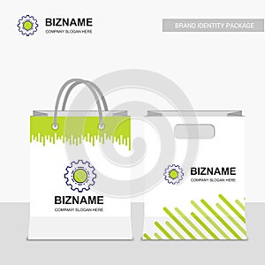 Company shopping bags design with gear logo vector