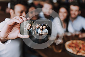 Company Smiling Friends Making Selfie in Pub