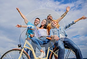 Company stylish young people spend leisure outdoors sky background. Cycling modernity and national culture. Bicycle as