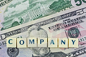 Company word on dollar background. Finance concept
