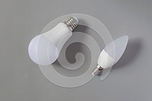 A comparative large and small light bulb, small and medium business.