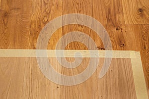 Comparison of luxury oak parquet flooring before and after application of oil-based floor finish